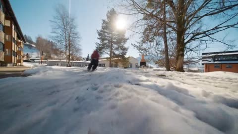 Freestyle Skiing Through a School