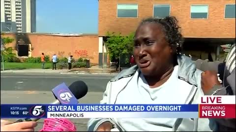 Woman Cries after black Lives Matter Riots in her Neighborhood