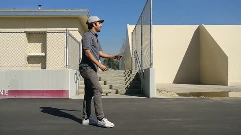 Grey shirt khaki pants stair jump