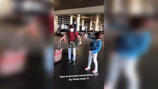 COVID: Moment Asian Mum Sprays Son At Airport Pickup