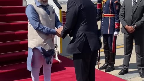 prim minister of receives pm modi upon his arrival in cairo