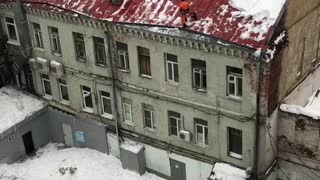 Worker Falls From Icy Roof