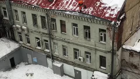 Worker Falls From Icy Roof