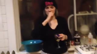 Girl grey shirt drinking beer and spilling it on sink