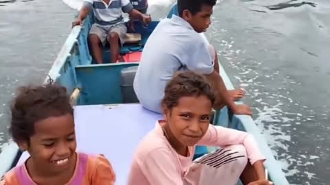 Brazilian fishermen fish deep in the sea