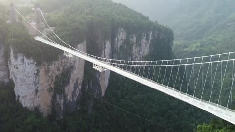 Bungy jump from the world's highest glass-bottom bridge