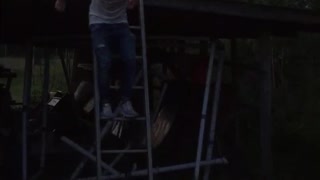 White shirt guy jumps off ladder and breaks foldable table