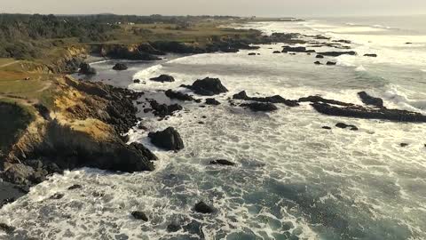 View of the sea and waves crashing