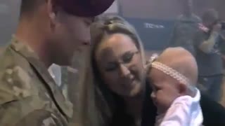 Soldier meets his baby girl!