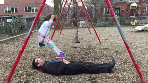 Awesome dad perfects swing stunt at the park