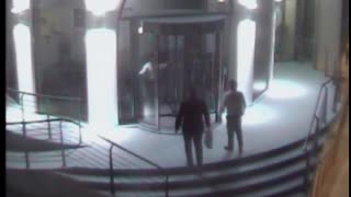 Man Gets Stuck In Revolving Door, Breaks Glass When He Pushes The Door