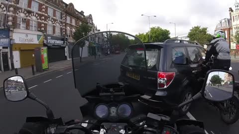 Motorcycle Crashes into Side of Vehicle