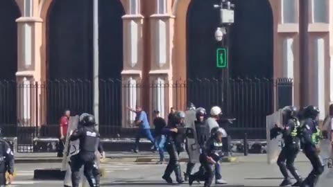 Gunfire in the capital of Caracas in Venezuela, with multiple people opening fire