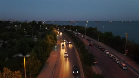 City traffic during the dusk near the seashore