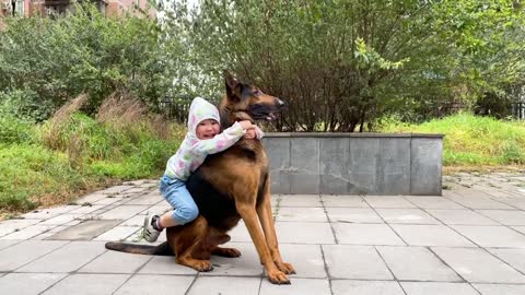 little girl and her animal friend