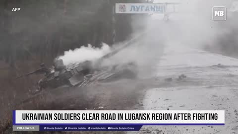 Ukrainian_soldiers_clear_road_in_Lugansk_region_afte.mp4