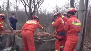 Firemen Rescue Woman Who Plunged 30ft Down Village Well