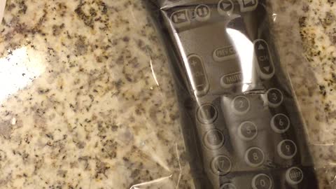 Sanitizing a Hotel Remote with Shrinkwrap