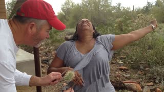 Woman Gives Strange Reaction To Cactus Pulled From Her Hand