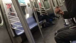Headphones guy sings beatles come together on subway car