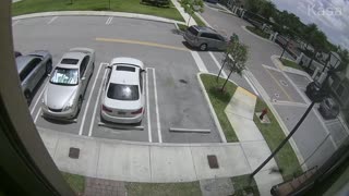 Car Speeds up and Slams Through Gate