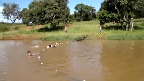 Fish catching in small water more people catching together