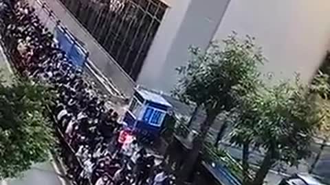 China - Millions of people line up to take a covid test, after 2 people test positive