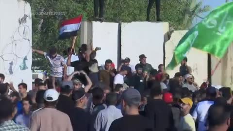 Protesters storm parliament building in Baghdad