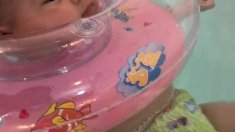 a three month baby swimming