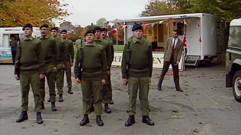 Mr Bean has fun shouting orders at some army personnel!