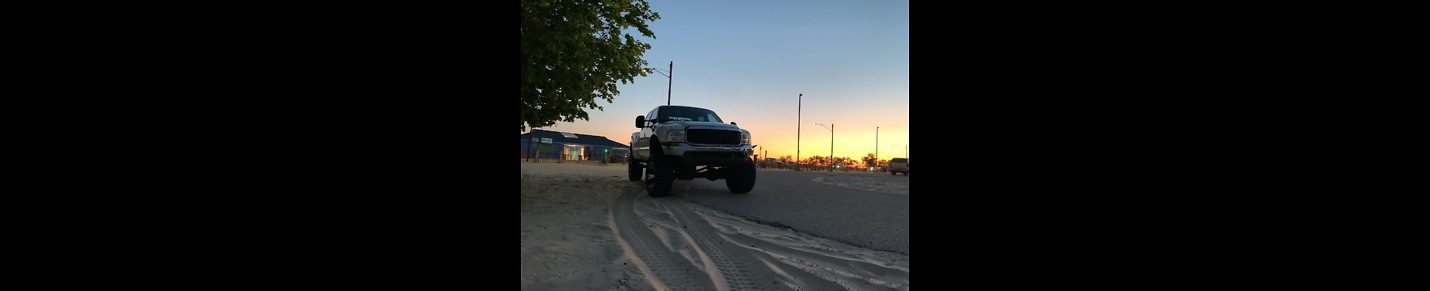 Offroad enthusiast doing auto repairs