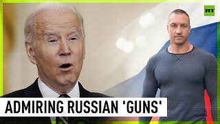 Biden stops to admire Russian cameraman’s muscles