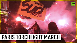 Torchlight protest against pension reform held in Paris