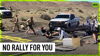 Activists block road in Nevada, get arrested at gunpoint