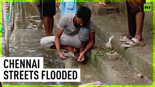 Locals seen fishing in inundated Indian city