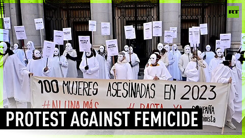 Feminist protesters hold masked rally in Spain