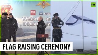 Putin takes part in flag raising ceremony on Russian nuclear subs
