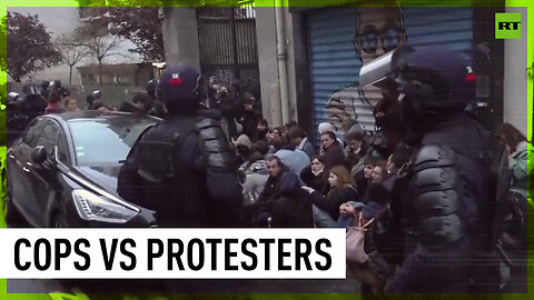 Paris police beat protesters with batons as demos against pension reform persist