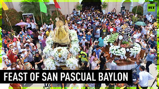 Believers perform fertility dance in front of Obando Church at Feast of San Pascual Baylon