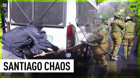 Water cannons, sticks & stones: Violent clashes erupt in Chile