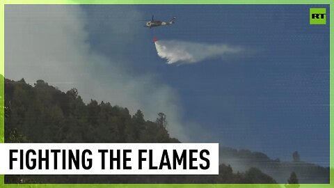 Firefighting helicopter take in Bogota wildfire