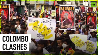 Tear gas & water cannons: Cops clash with protesters in Sri Lanka