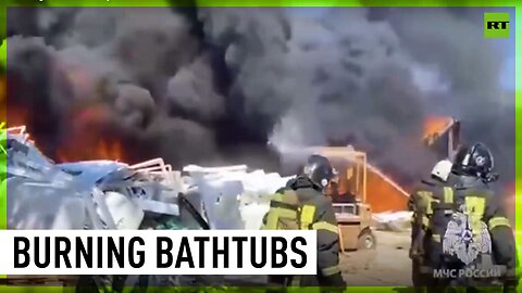 Russian firefighters battle factory blaze