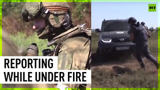 RT crew reports from Donbass frontline while under Ukrainian fire