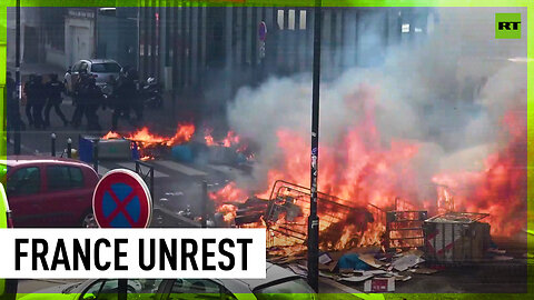 Fire, water cannons and clashes: Protests wreak havoc across France