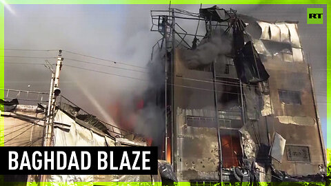 Fire engulfs commercial building in Baghdad
