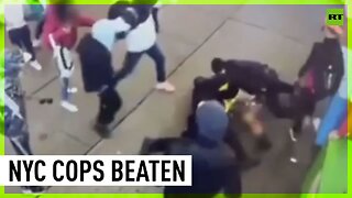 Cops beaten by mob as they try to make arrest