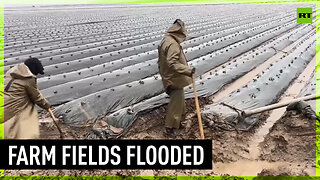 California farm fields submerged by flooding