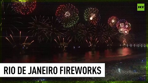 New Year’s fireworks light up night sky over Copacabana Beach in Brazil