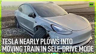 Tesla nearly plows into moving train in self-drive mode